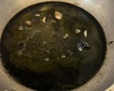 A picture of step 4 of One-Pan Spaghetti with Squid Ink and Lemon.