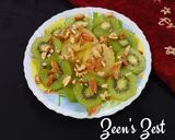A picture of step 3 of Green and Sun Gold Kiwis Salad with toasted Almonds.
