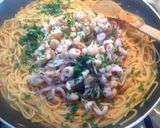 A picture of step 12 of Spaghetti with Langoustines, Shrimp, Calamari, and Clams.