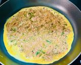 A picture of step 3 of Omelette with canned tuna on toast.
