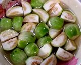 A picture of step 2 of Green Curry Squid in Young Coconut.