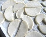 A picture of step 2 of Extra Crunchy Pickled Daikon.