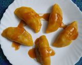 A picture of step 8 of Palm dumplings stuffed with sweetened coconut.
