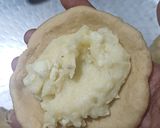 A picture of step 3 of Cashew khoya poli.