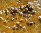 A picture of step 2 of Chana masala with Roti.