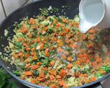 A picture of step 4 of Stuffed peppers with a twist! No meat.