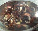 A picture of step 2 of Marinated and Grilled Octopus with Mixed Salad, Potatoes, Avocado, and Almonds in a Breadstick Basket.