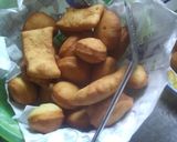 A picture of step 8 of Orange mandazi.