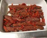 Une image de l'étape 5 de Merguez aux poivrons rouges, échalotes et herbes.