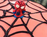 A picture of step 4 of Spiderman cake.