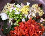 A picture of step 3 of Spicy Tomato Rava Upma.