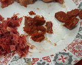 Foto del paso 8 de la receta: Alubias estofadas con lombarda al ajillo, chorizo y jamón