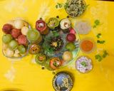 A picture of step 7 of Panipuri (7 types of water with 4 flavour  of  puries).