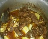 A picture of step 14 of Lauki gosht ka salan.
