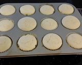 A picture of step 13 of White Chocolate Truffle Cupcakes with Whipped White Chocolate Mascarpone Frosting.
