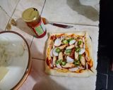 A picture of step 17 of Chicken tikka pizza (without oven bake in pateela).