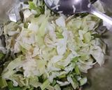 A picture of step 1 of Cabbage and green onion pakoda.