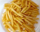 A picture of step 1 of My Parmesan melted Cheese over French fries 😘.