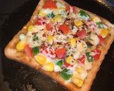 A picture of step 5 of Bread Pizza.