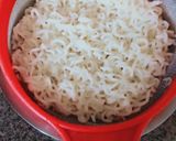 A picture of step 1 of Cheesy schezwan Maggi.