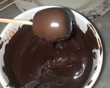 A picture of step 3 of 1 bite chocolatey marshmallow pops.
