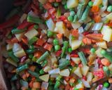 Zöldségfélével töltött paprika recept fázis 2 fotója
