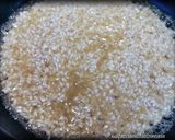 Foto del passaggio 3 della ricetta Risotto ai Peperoni Cruschi con Capocollo e Caciocavallo Podolic