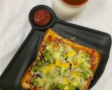 સેઝવાન બ્રેડ પીઝઝા (Schezwan Bread Pizza Recipe In Gujarati) રેસીપી સ્ટેપ4ફોટો