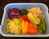 A picture of step 3 of Rainbow Vegetables Rolls with Peanut Sriracha Dipping Sauce.