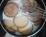A picture of step 2 of Marie Bisquits Pudding.