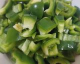 A picture of step 4 of Tomato with chillies.