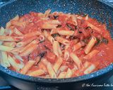 A picture of step 4 of Penne alla Norma.