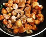A picture of step 4 of Baby Potato Fry with Corn Flour.