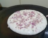 A picture of step 3 of Onion Podi Uttapam.