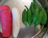 A picture of step 1 of Carrot Radish and Green chilli instant pickle.