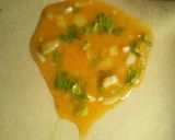 A picture of step 2 of Mughlai paratha with egg.