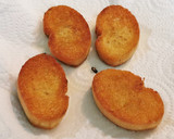 Foto del paso 4 de la receta: Pincho de Morcilla con Piquillos, Cebolla caramelizada y Piñones