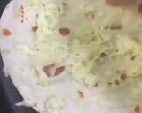 A picture of step 2 of Quesadilla (with few drops of oil and food turns delicious).
