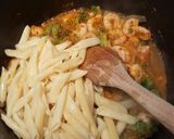 A picture of step 6 of Prawny pesto pasta.