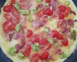 A picture of step 6 of Bacon,Tomato, Advacado Omelette.