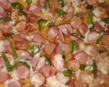 A picture of step 4 of Sausage pizza.