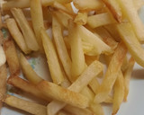 Foto del paso 5 de la receta: Milanesa a la napolitana con papas fritas y huevo
