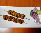 A picture of step 3 of Pork Tikka masala kebab 🫑🍅🧅🌶️.