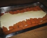 A picture of step 3 of Cheesy Fish Finger and chips bake.
