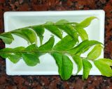 A picture of step 1 of Curry Leaves Pepper Chicken.