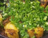 A picture of step 4 of Green onion potato sabzi.