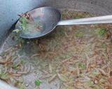 A picture of step 1 of Aloo matar gajar mix veggies.