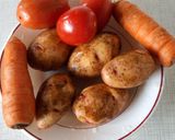 A picture of step 1 of Spiral potato and carrots on stick.