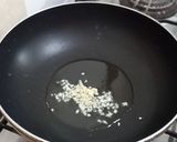 A picture of step 1 of Baingan(Brinjal) Aloo(potato) ki Bujhya.
