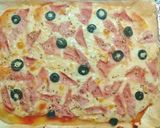 Foto del paso 6 de la receta: Pizza prosciutto con aceitunas negras